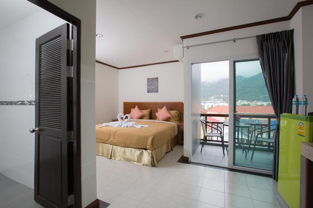 Chusri Hotel Patong Chambre photo